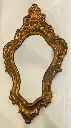Antique copper and wooden ornamented mirror 47x28cm