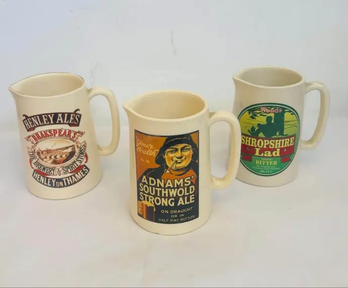 3 vintage collectibles bar advertising jugs. (England)