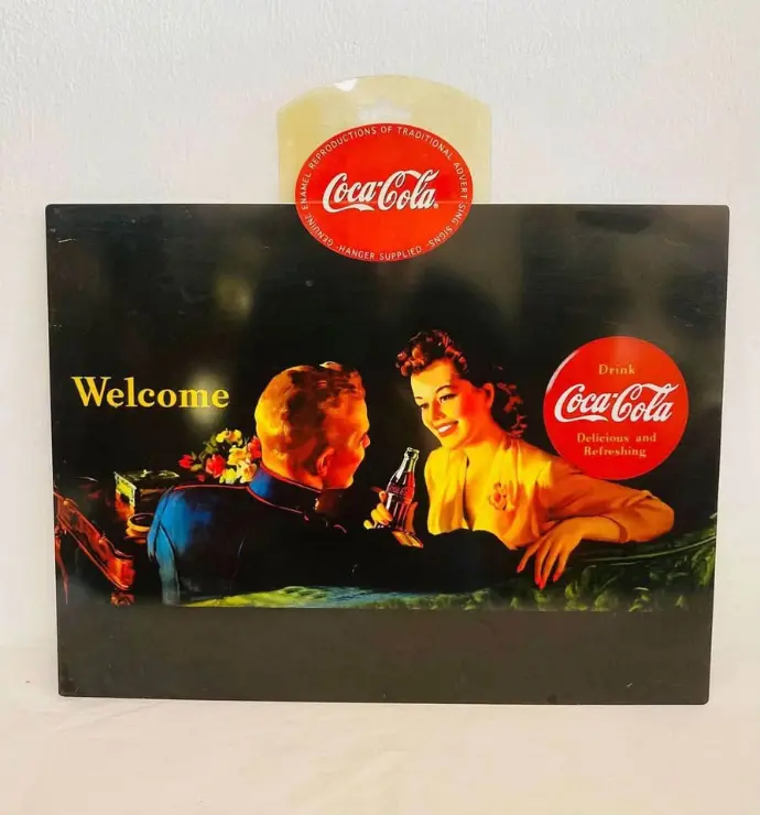 Collectible large coca cola tin sign with original hanger. 40x30cm.