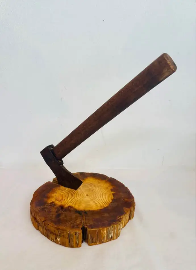 Antique handmade axe on wooden base. 37x13x8cm.