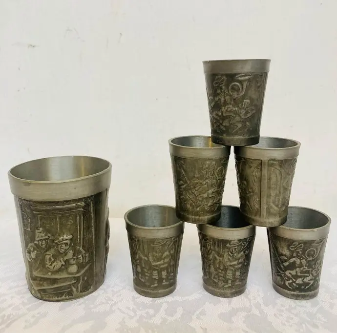 Collection of antique pewter shots and cup!