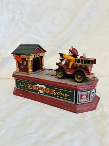 Vintage large collectible heavy cast iron piggy bank fire station. 26x11cm