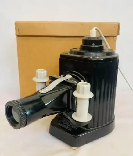 Antique 1940-50’s Magica Pouva bakelite projector in original box (working)