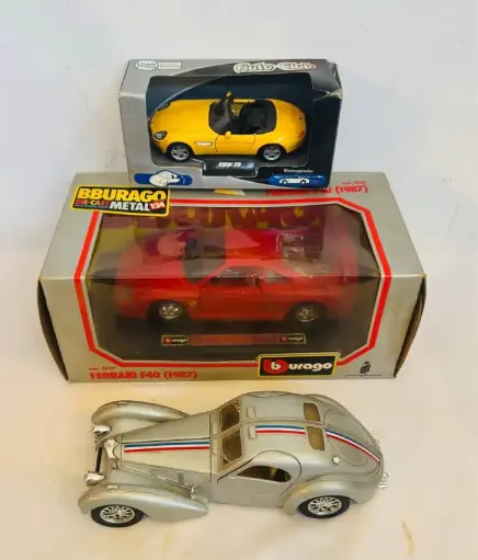 Collection of 3metal die-cast cars 2x Burago 1/24 Made in Italy.18x5cm and 1 welly.