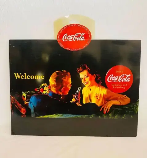 Collectible large coca cola tin sign with original hanger. 40x30cm.