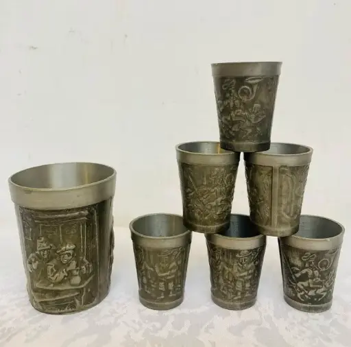 Collection of antique pewter shots and cup!