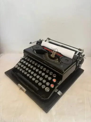 Antique 1920-30’s Cast Iron Triumph Typewriter-Glass Buttons & Wooden Case. Great condition Working 34cm