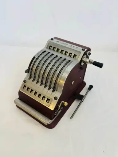 Vintage 1950’s collectible Resulta small metal mechanical adding machine/calculator. Working.15x12cm